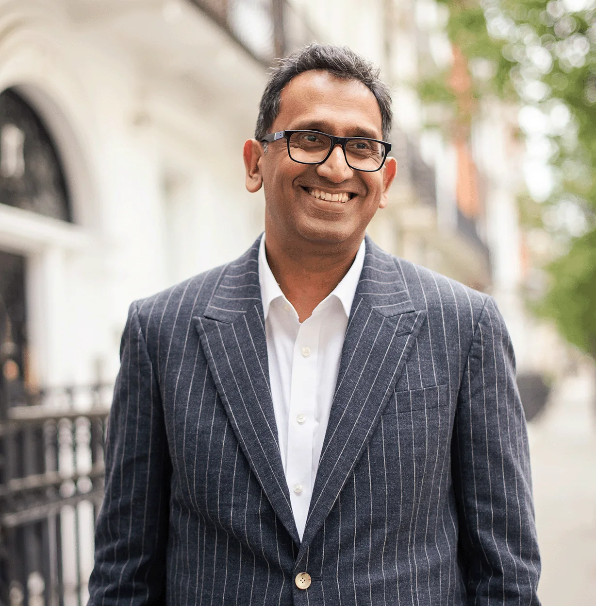 Professor Prasanna Sooriakumaran, prostate cancer surgeon, standing outdoors in London