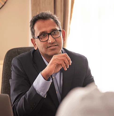 Professor Prasanna Sooriakumaran during a consultation