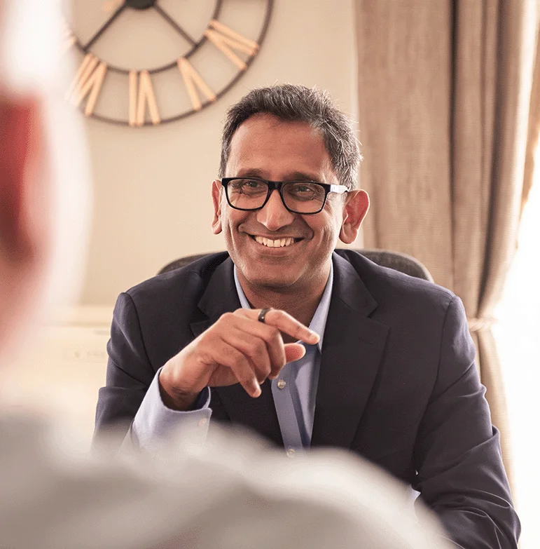 Professor Prasanna Sooriakumaran during a patient consultation