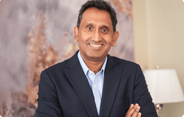Professor Prasanna Sooriakumaran, smiling portrait